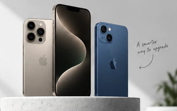 Titanium and blue iPhones on a light stone display